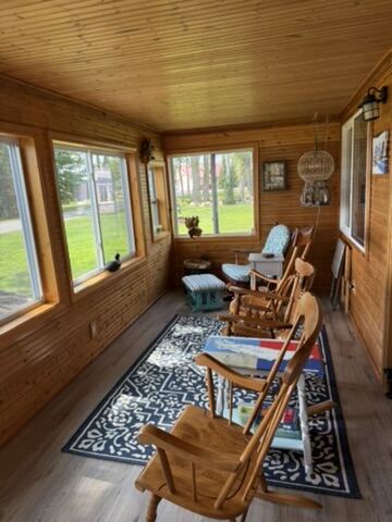 Wood-paneled sunroom